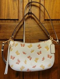 coach bolsa with butterfly print