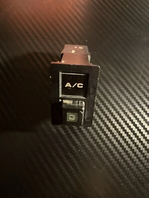 Nissan D21 1986-1994 camioneta pickup Pathfinder carrocería dura botón de interruptor de aire acondicionado OEM Foto 1 de 2