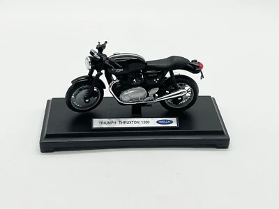 Welly 1:18 Motorrad Triumph Thruxton 1200 verschiedene Biker Modelle NEU in OVP - Bild 1 von 2