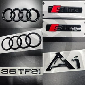 JUEGO COMPLETO REJILLA/BOTA/GUARDABARROS INSIGNIAS NEGRAS AUDI A1 Inc 2 X S-Line/35 TFSI 2019+ - Imagen 1 de 1