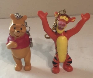2 Disney Schlüsselanhänger Winnie Puuh & Tigger - Bild 1 von 4