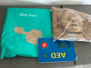 Laerdal Mini Anne CPR Mannequin Practice Doll - Picture 1 of 7