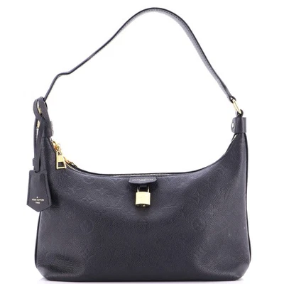 Bolso de mano Louis Vuitton Sac Sport casi nuevo monograma cuero Empreinte Foto 1 de 4