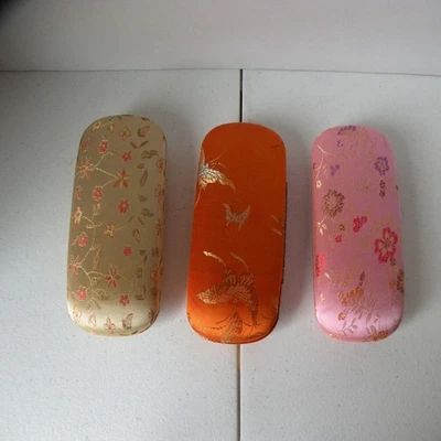 Lote de 3 estuches para gafas de tela brocado chino naranja, rosa y beige Foto 1 de 4
