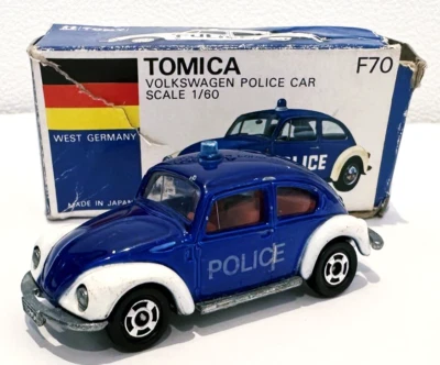 Coche de policía Tomy Tomica serie F70 Volkswagen escala 1/60 con caja Foto 1 de 4