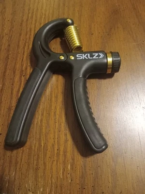 Agarre de mano Sklz entrenador de fuerza agarre de mano - negro 20 - 90 libras ajustable  Foto 1 de 2