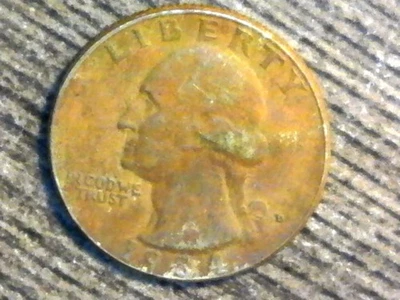 Planchet Washington Quarter 1984-D mal recocido Foto 1 de 4