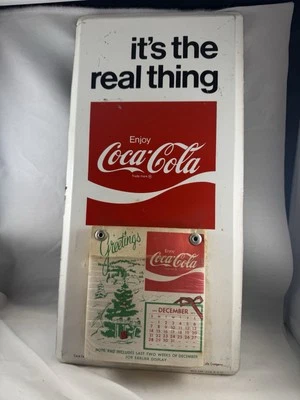 Coke Metal Calendar Holder “ it’s the real thing “  1975 - Image 1 of 4