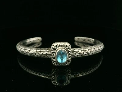 Pulsera de plata de ley 925 y piedras preciosas de topacio azul ovalado Foto 1 de 4