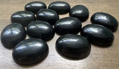 Lote de 12 cabujones ovalados obsidiana negra 20 mm X 25 mm Foto 1 de 2