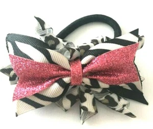 Beautiful Sparkly Pink black/white ponytail style inspired hair bow for girls.  - Picture 1 of 1