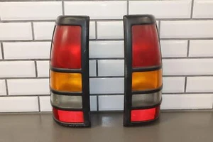 01-03 Chevy GMC GMT800 Juego de luces traseras dobles OEM (izquierda/derecha) negro recortado - Imagen 1 de 20