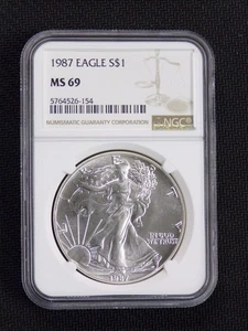 1987 AMERICAN SILVER EAGLE 1oz .999 FINE SILVER NGC GRADED MS69 $1 COIN USA - Picture 1 of 2