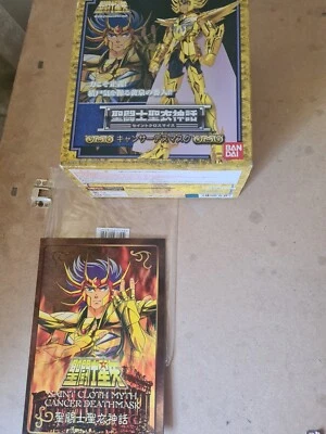 Bandai | Saint  Cloth Myth CANCER DEATHMASK ALDEBARAN  Gold  Figure w/bonus gift - Image 1 of 4