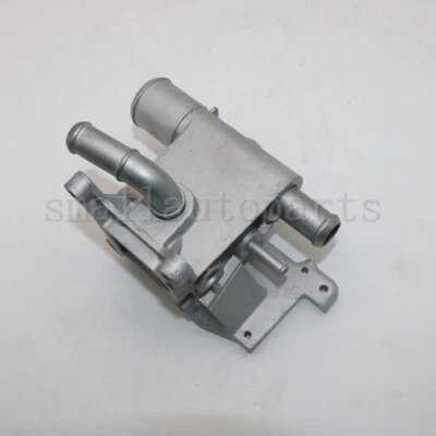 Brida de salida de refrigerante del motor del radiador original L3271517Z para Mazda 3 5 2004-2007 Foto 1 de 4