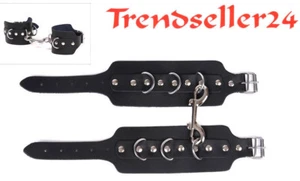Handfesseln aus Leder mit 3 Halbringen und Doppelkarabiner - Bild 1 von 1