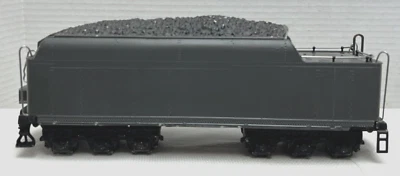 HUDSON PRODUCTS O-GAUGE 700T GRAY UNDECORATED DIECAST 12-WHEEL TENDER - Image 1 of 4