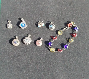 Lot of 8 Sterling Silver Evil Eye Jewelry – 6 Charm Pendants, Bracelet & Earring - Picture 1 of 7