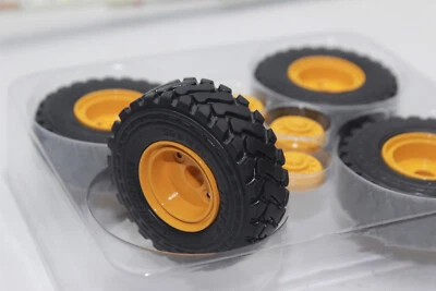 At 3200124 4x Michelin 20.5 R25 XHA2 Tires + Rims for 1:32 Wheel Loader New OVP - Image 1 of 4