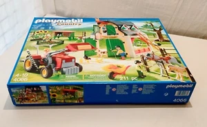 LOT PLAYMOBIL FERME AVEC TRACTEUR 4066 NEUVE AVEC BOITE- JAMAIS OUVERT - Photo 1/5