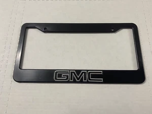 Marco de matrícula de plástico negro para GMC camión coche SUV NUEVO EE. UU. - Imagen 1 de 1