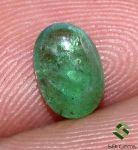 Cabochon ovale smeraldo naturale certificato 7x5 mm 0,77 Cts pietra preziosa sfusa - Foto 1 di 4