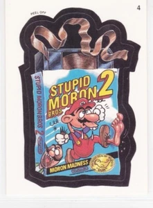 Tarjeta coleccionable Topps Wacky Packages Stupid Moron Bros. 2 1991 (spoof SMB2) - Imagen 1 de 2
