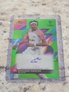 MOHAMED SIMAKAN 2023 TOPPS MEJOR VARIACIÓN REFRACTOR UEFA AUTOMÁTICO 18/99 (B4) - Imagen 1 de 2