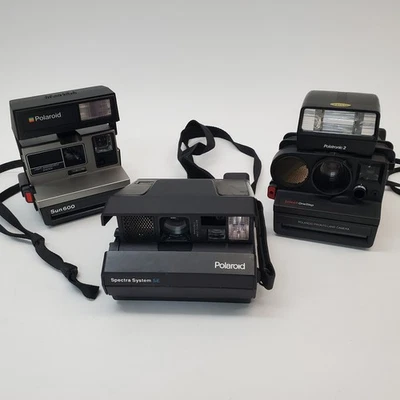 Lotto 3 fotocamere Polaroid vintage per ricambi/riparazione: Sun 600, Spectra SE, Pronto Land - Immagine 1 di 4