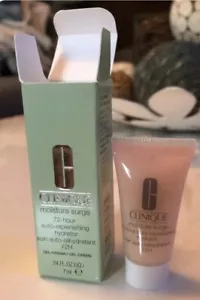 NUOVO IB CLINIQUE Moisture Surge 72 ore idratante auto-ricostituente .24 oz/7 ml mini - Foto 1 di 1