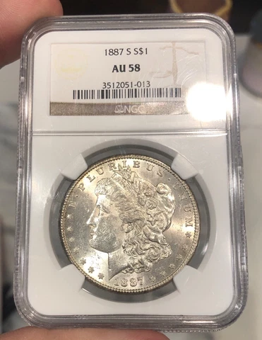 1887-S Morgan Dollar graded AU58 by NGC Nice Off White Almost Uncirculated Coin Cover