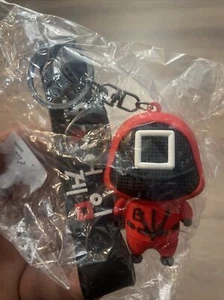 SQUID GAMES KEYCHAIN - HIGH QUALITY DETAILED SILICONE KEYCHAIN - SQUARE SYMBOL - Picture 1 of 3