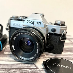 Canon AE-1 SLR Film Camera w/ Canon Lens FD 28mm F3.5 s.c.! (Battery door issue) - Picture 1 of 24