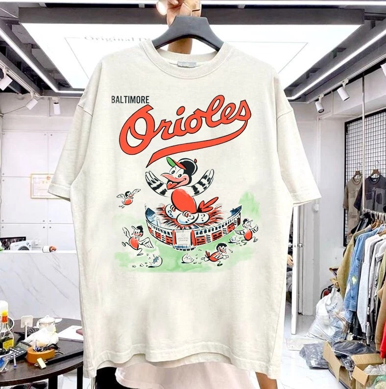 Baltimore Orioles 1960 Yearbook short sleeve sand color shirt KV30822 - Image 1 of 1