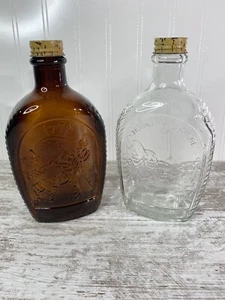 Vintage Log Cabin Syrup Bottles 1776 Amber Glass & Clear Mount Rushmore Lot Of 2 - Picture 1 of 18