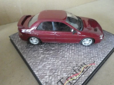 SUBARU IMPREZA ROAD CAR METALLIC RED TROFEU  1:43 - Image 1 of 4