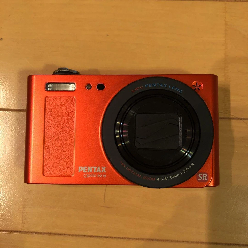 PENTAX Optio RZ18 16.0MP 25mm optical 18x Zoom Digital Camera Metallic Orange - Image 1 of 1