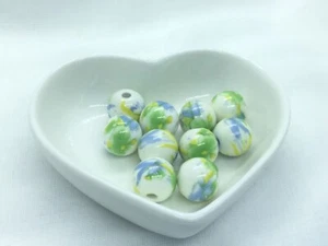 10 beautiful ceramic porcelain beads, 12mm, cream with yellow, blue & green - Picture 1 of 3