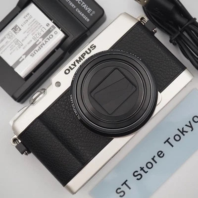 [Near Mint] OLYMPUS STYLUS SH-1 Silver Digital Camera Tested w/Battery Charger - Image 1 of 4