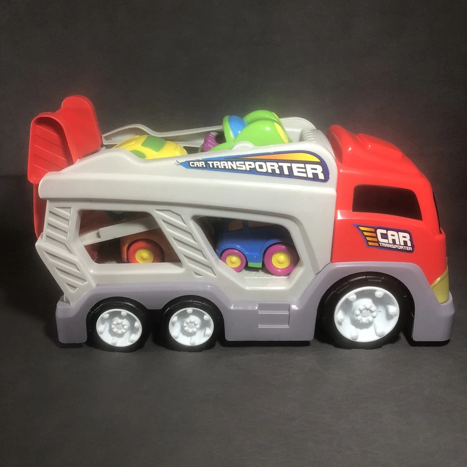 Plastic Car Hauler With 4 Plastic Cars with Lights and Sounds - See Video 16" L - Image 1 of 4