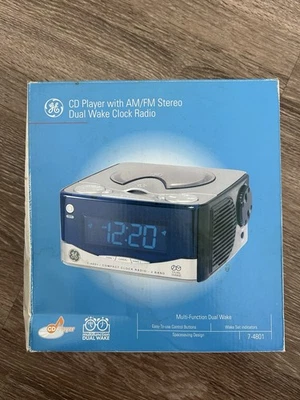 New In Box GE 7-4801A Dual Wake Clock Radio AM/FM CD Player 120V 60Hz 11W Silver - Image 1 of 3