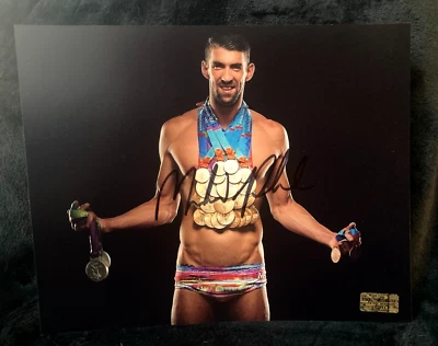Fotografía firmada por Michael Phelps de 8" X 10" que muestra las 28 medallas con certificado de autenticidad... hallazgo raro Foto 1 de 4