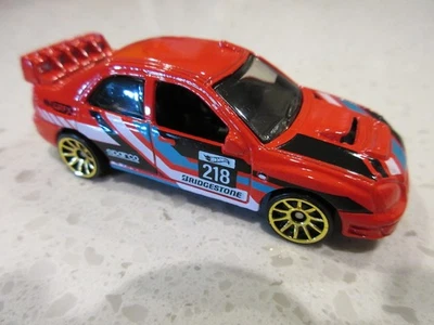 2025 Hot Wheels Subaru Impreza RED Exclusive Color & Design Toy Race Car - Image 1 of 4