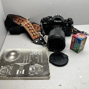 Canon A-1 SLR Camera + Soligor 35-140mm Lens Vtg 35mm Film + Manual Included - Picture 1 of 11