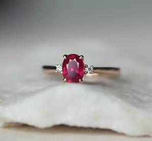 1.00CT Oval Lab Created Ruby Three Stone Engagement Ring 14K Rose Gold Plated - Picture 1 of 6