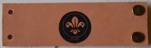 PASAPAÑOLETA DE CUERO CON LIS SCOUTS INTERNACIONAL # 1658 - Imagen 1 de 1