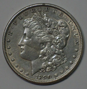 1890 $1 MORGAN SILVER DOLLAR COIN LAMINATION ERROR ON CHEEK - Picture 1 of 2