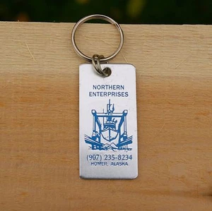Portachiavi Northern Enterprises Homer Alaska tono argento metallo blu barca cantiere nave - Foto 1 di 4