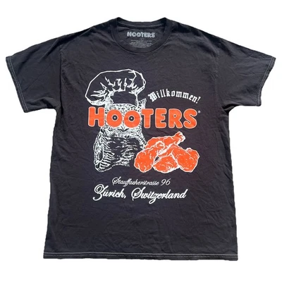 Camiseta De Colección Hooters Zürich Suiza Negra Para Hombre Talla L Alas de Búho Rara Foto 1 de 4