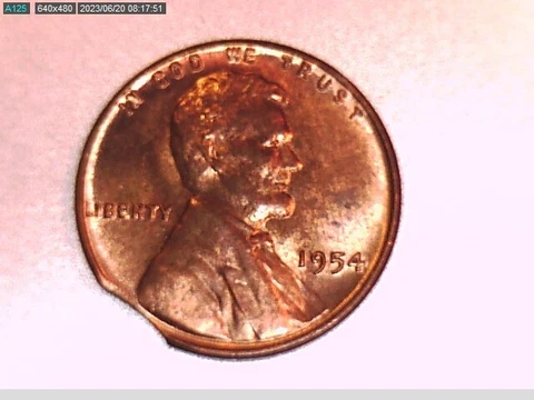 1954-P Wheat Cent Error - Struck on a Curved Clipped Planchet - Scarce Date! Cover